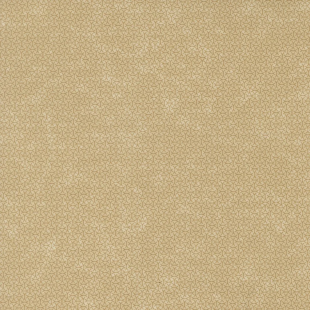A beige fabric with a small, repeating geometric pattern.