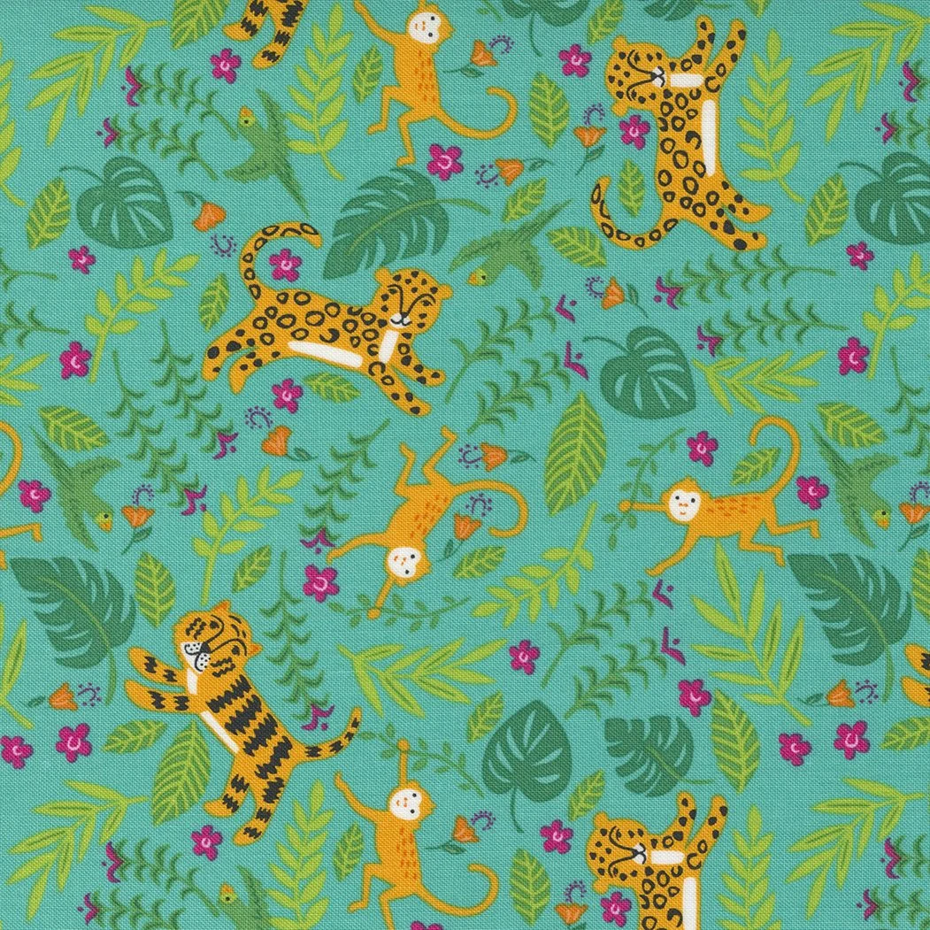 Colorful jungle fabric featuring cartoon jaguars, monkeys, toucans, green leaves, pink flowers, and small orange butterflies on a turquoise background.