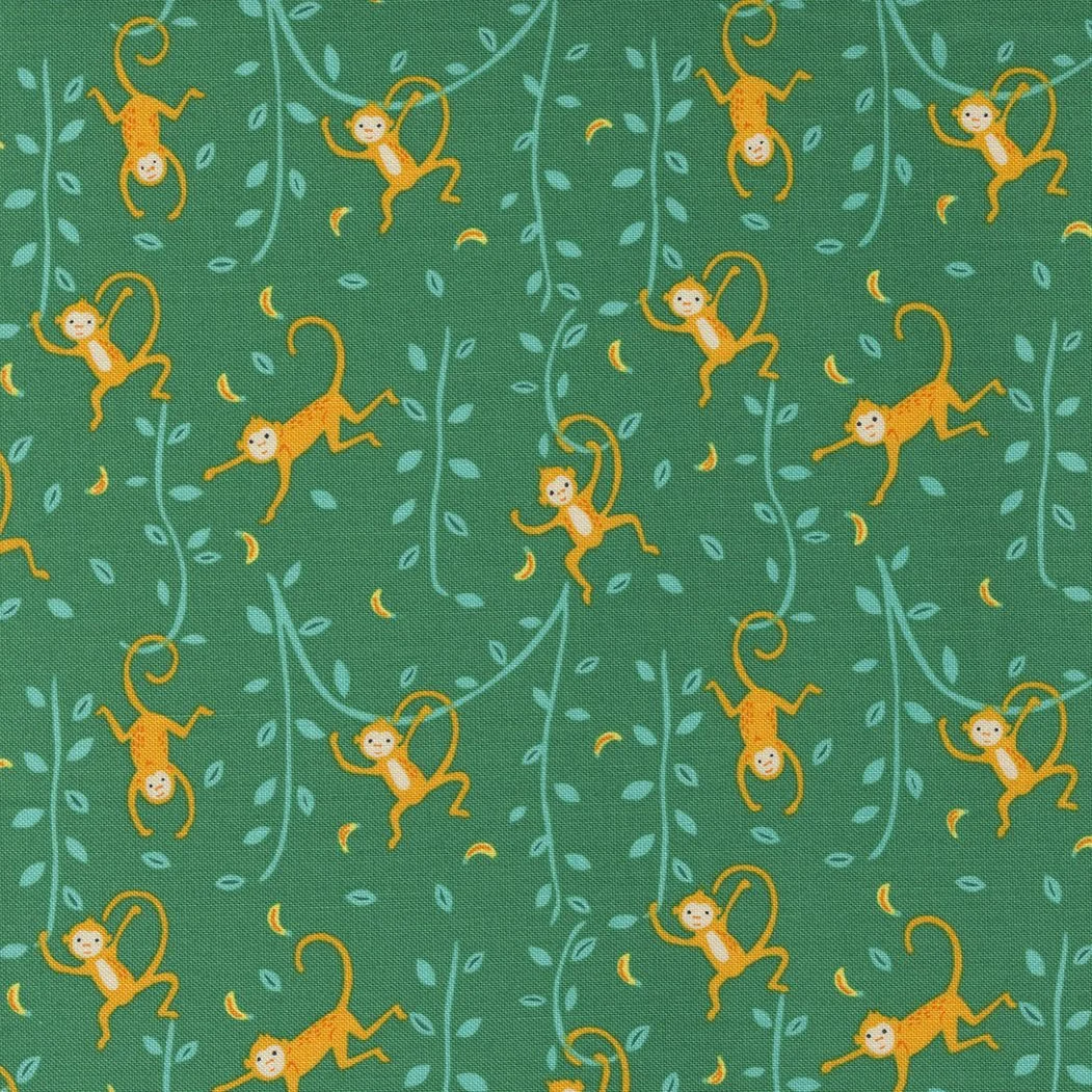 Pattern featuring yellow monkeys with smiling faces hanging from blue vines on a green background, with scattered yellow banana shapes.