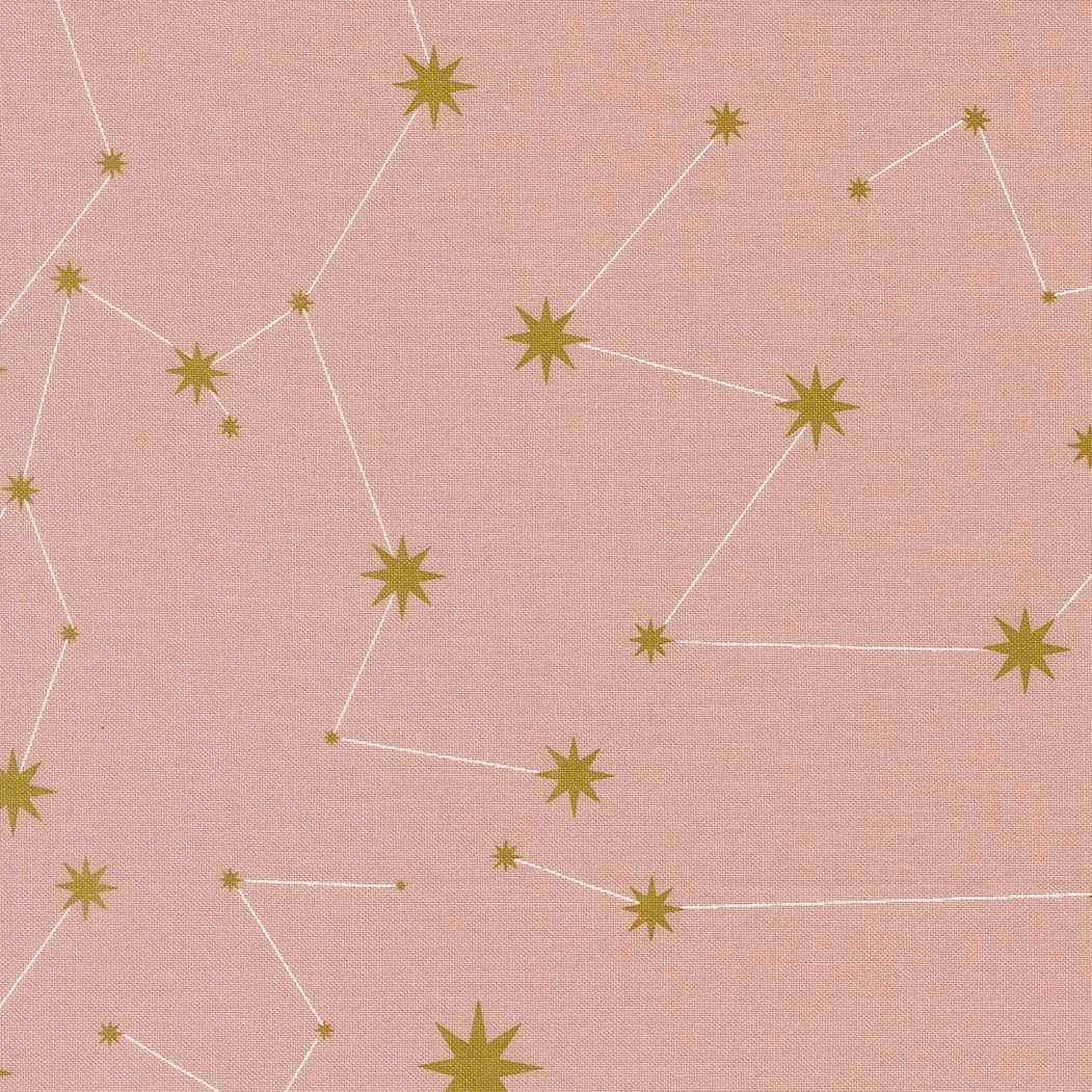 A pink textured background with gold star and dot constellation patterns connected by thin white lines.