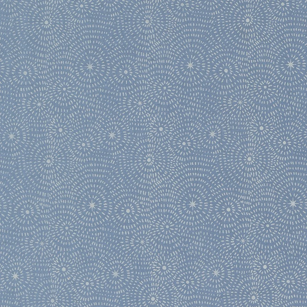 Light blue textured fabric with white circular fireworks pattern