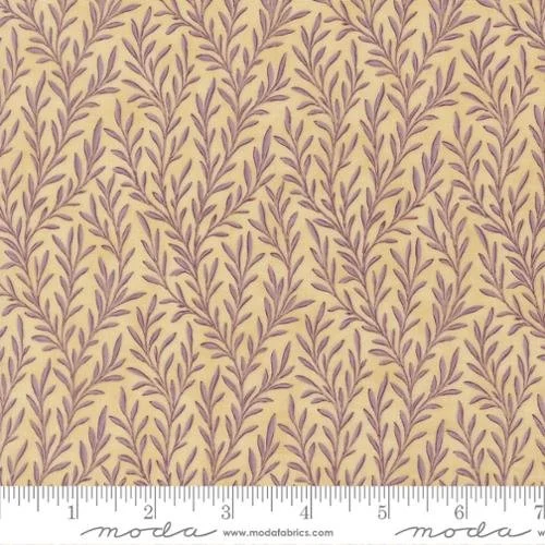 Close-up of fabric with a beige background and a repeated pattern of purple leafy branches.
