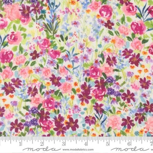 A colorful floral fabric pattern featuring pink, purple, orange, and yellow flowers with green leaves, and a measuring ruler at the bottom.