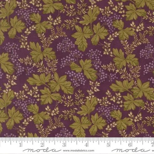 Fabric with a purple background covered in a pattern of green leaves and purple berry clusters.