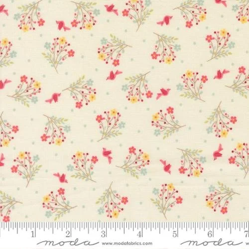 Fabric with a floral and bunny pattern on a light background, featuring small red bunnies and pink and yellow flowers with green leaves.