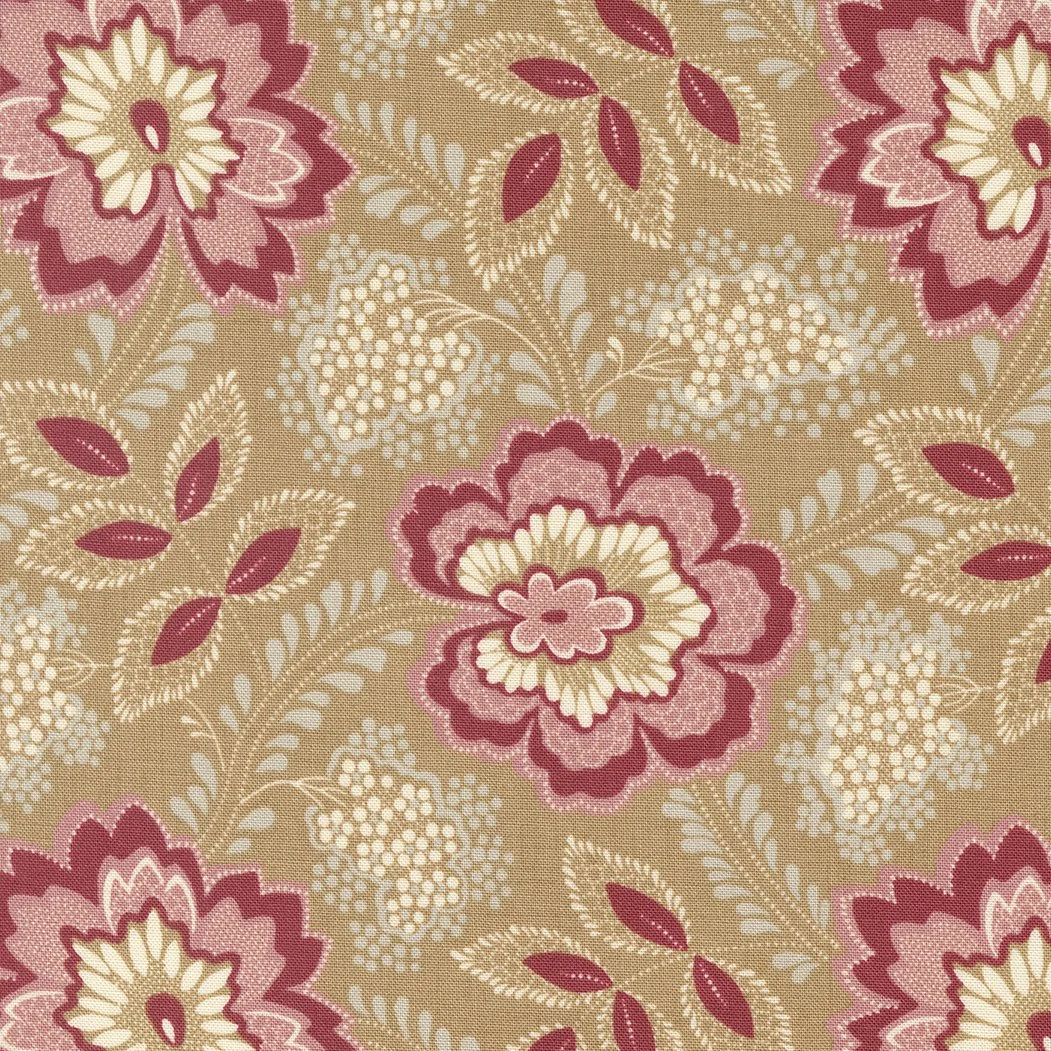 A floral patterned fabric with large pink and cream flowers, red leaves, and beige background.