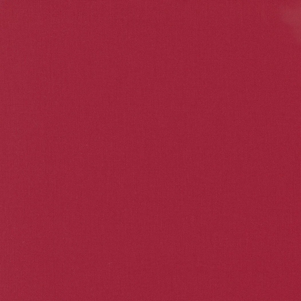 Red fabric with a textured pattern.