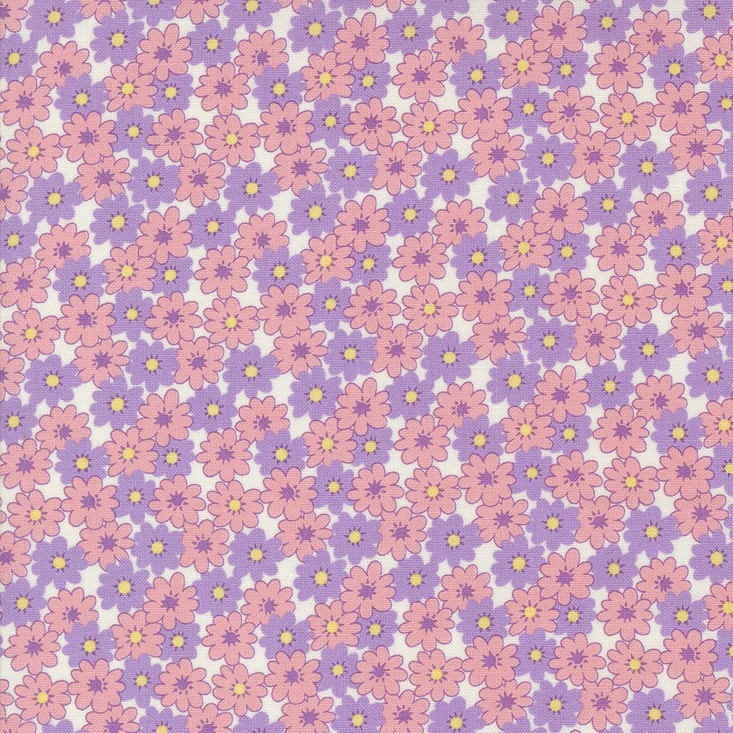 Pattern of pink and purple flowers with yellow centers on a light background.