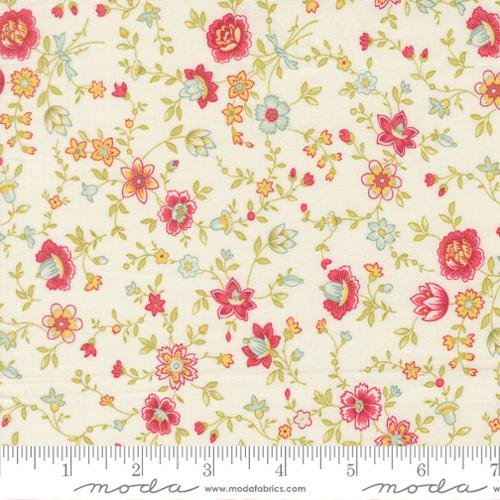 Close-up of floral print fabric with small pink, red, orange, yellow, and blue flowers, green leaves, and thin vines on a cream background, with a ruler at the bottom