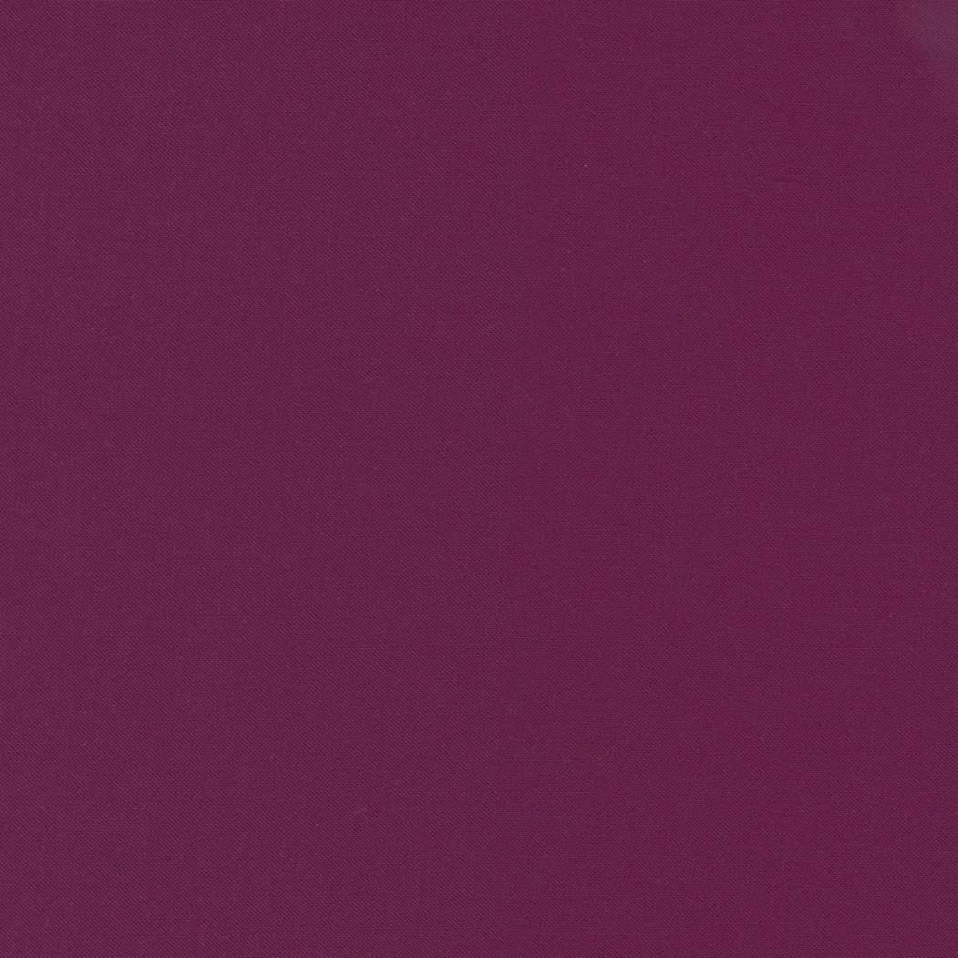 Solid pink textured background.