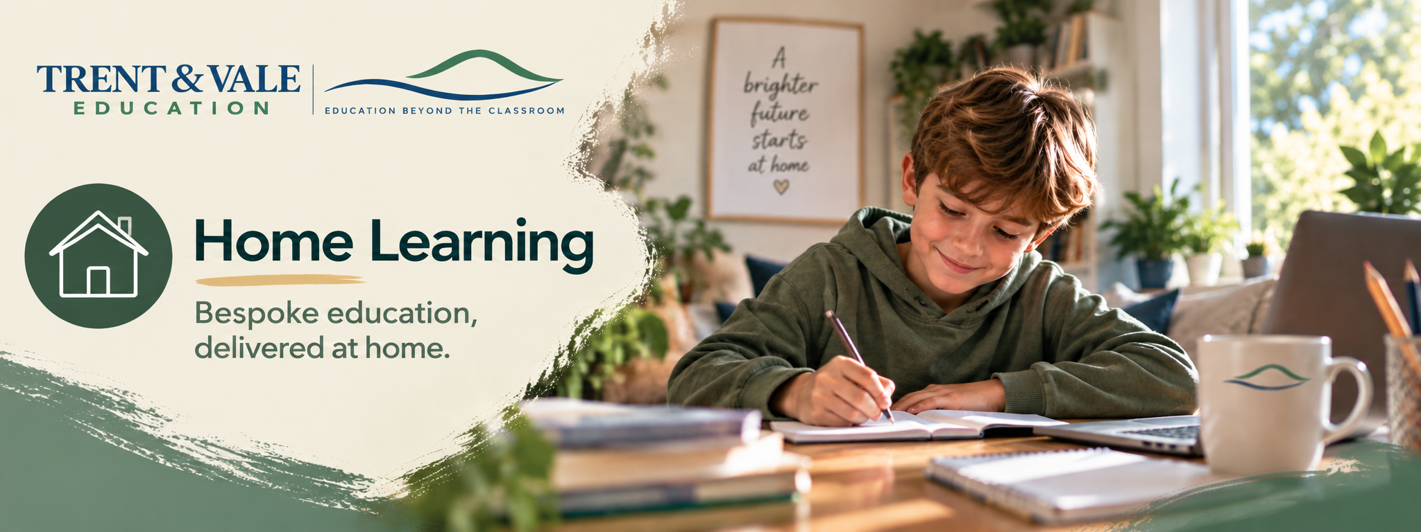 A young boy with brown hair sitting at a home desk, writing in a notebook with a smile. The setting is a bright room with large windows, plants, and home decor including a framed quote that says "A brighter future starts at home."