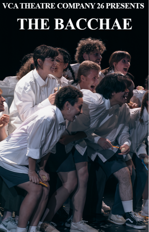 Group of young people dressed in white shirts and dark skirts, acting excited and energetic on stage for a theatrical performance of 'The Bacchae' by VCA Theatre Company.