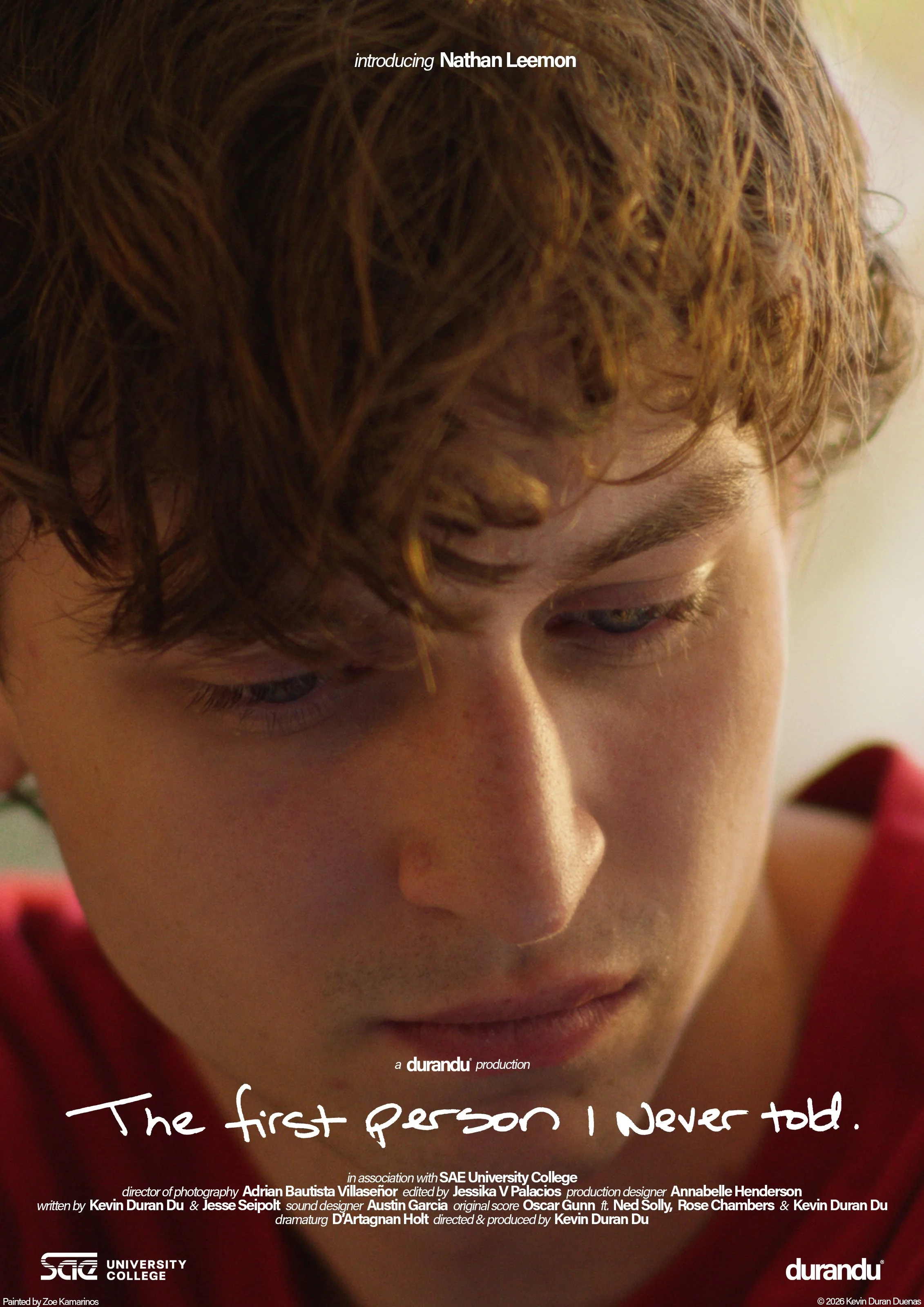 Close-up of a young person with curly red hair looking down, with text overlaid reading 'Introducing Nathan Leemon,' and additional text credits and logos for SAE University College and Durandu.