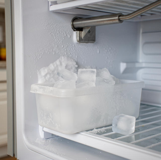 Empty ice maker bin with working water dispenser spout