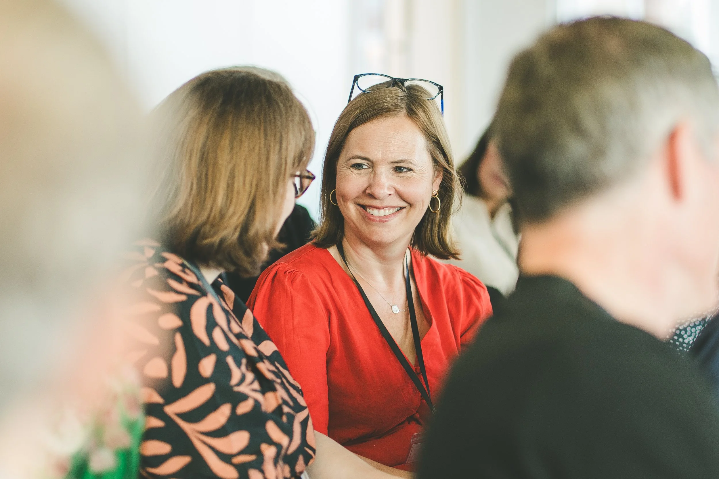 Alex White, Executive Coach and MD, in conversation during a team building workshop