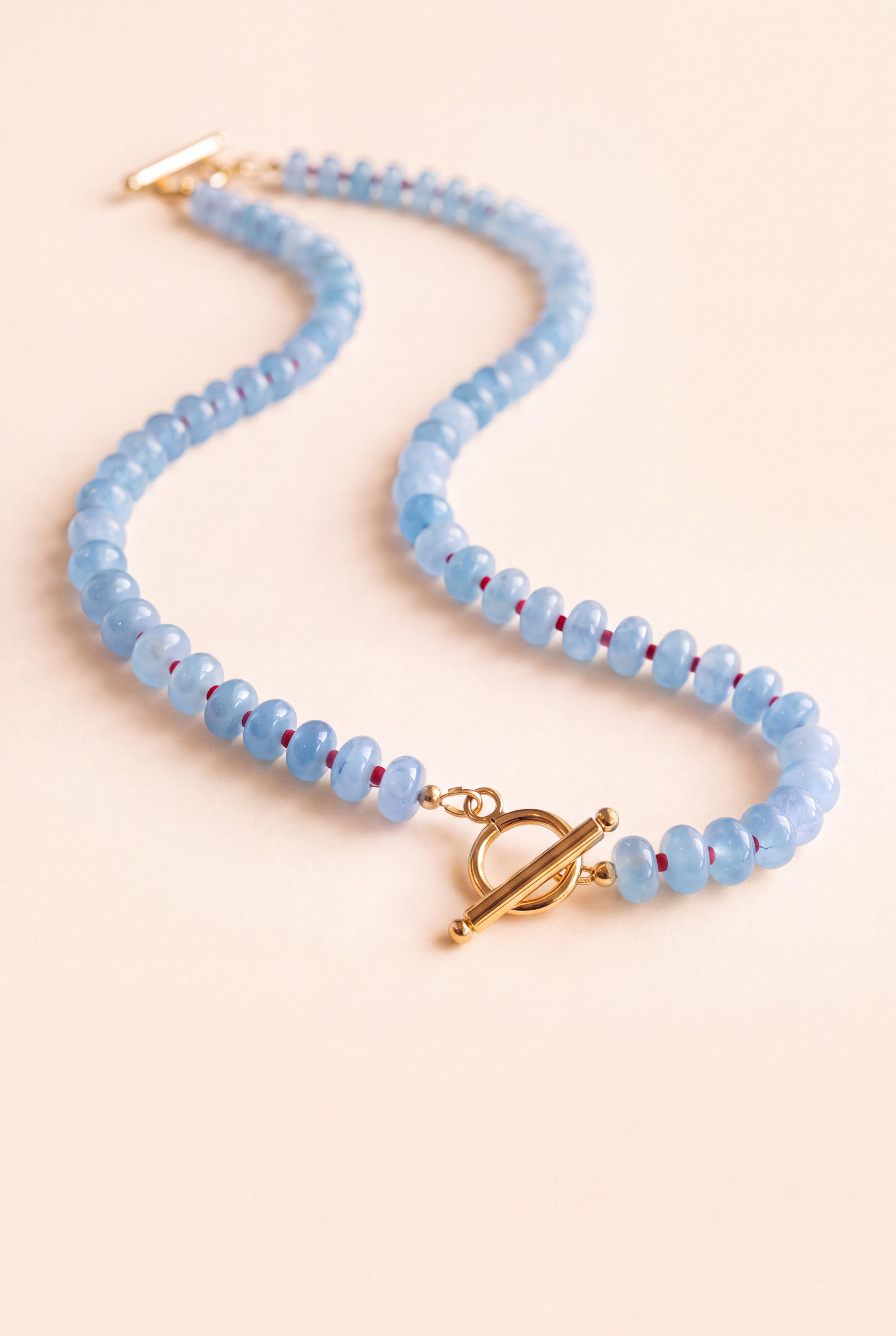 Firefly_Gemini Flash_remove copy keep only the necklace and the background put it on a light light light o 725495.png