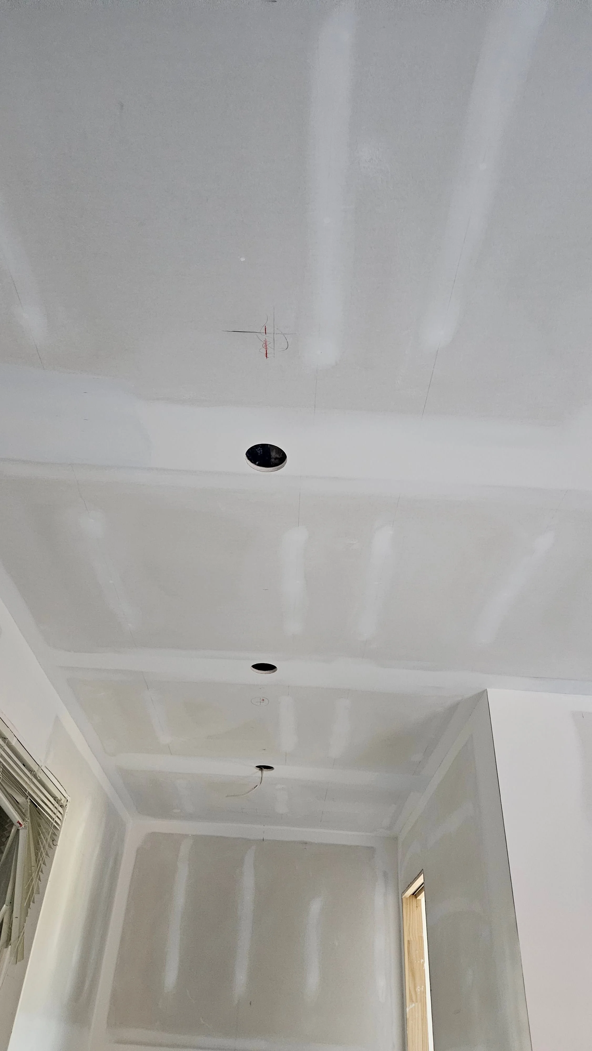 Garden suite ceiling with drywall hung straight and seams taped