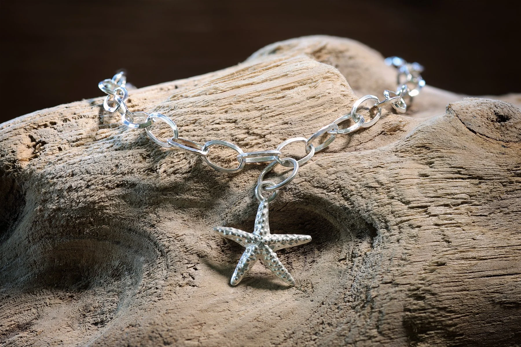 Sterling Silver Oval Link Bracelet with Starfish Charm