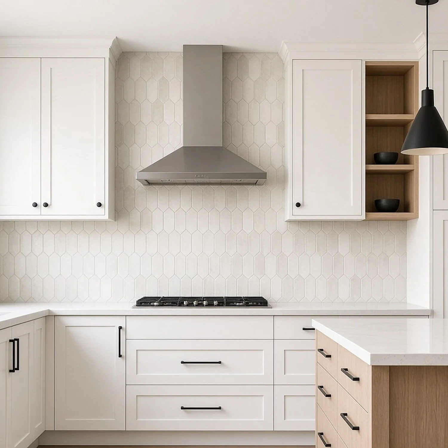 Modern kitchen with white cabinets, a backsplash with hexagonal tiles, a stainless steel range hood, a black stove, and a black pendant light.