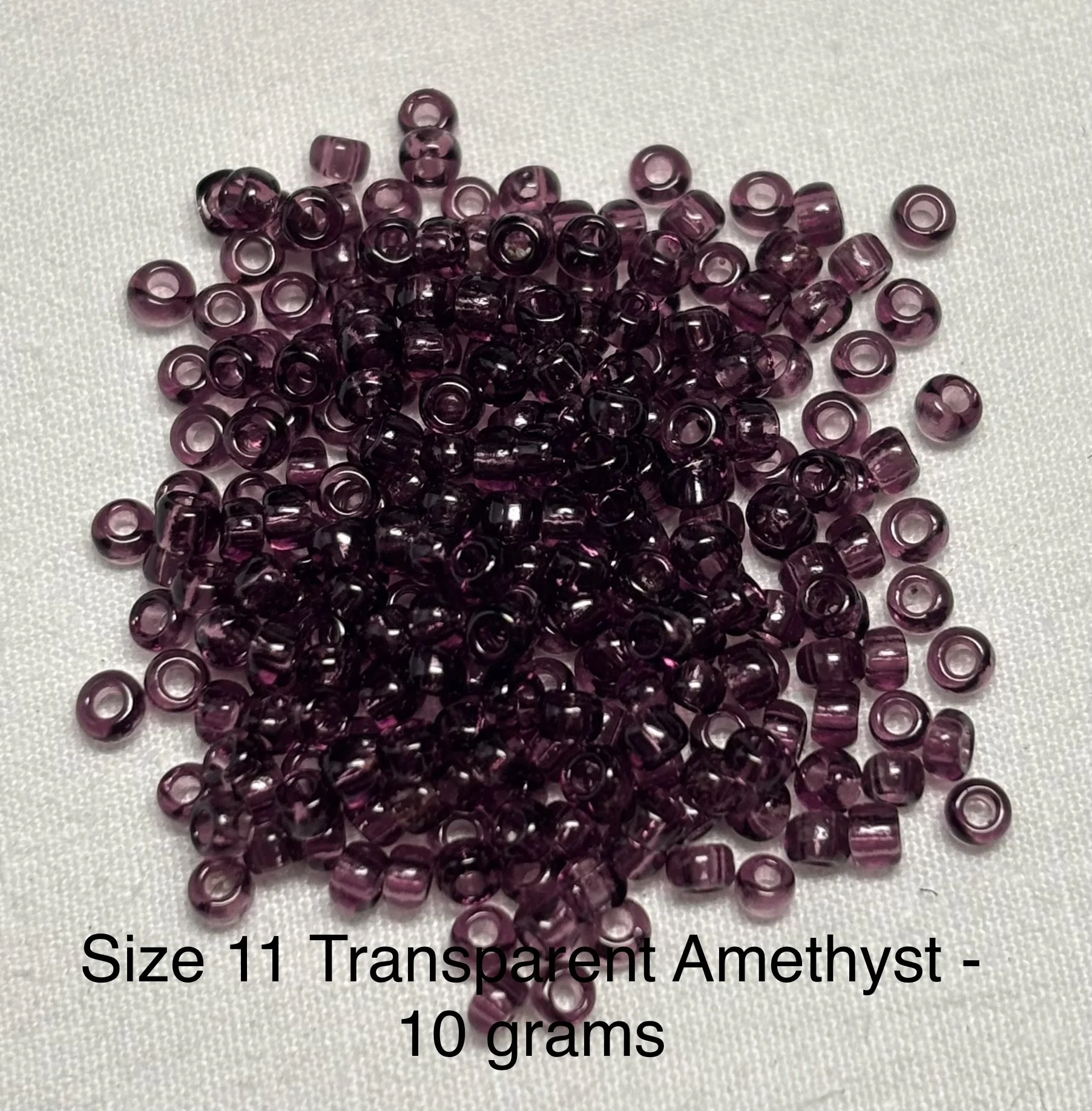 11/0 Antique Transparent Amethyst