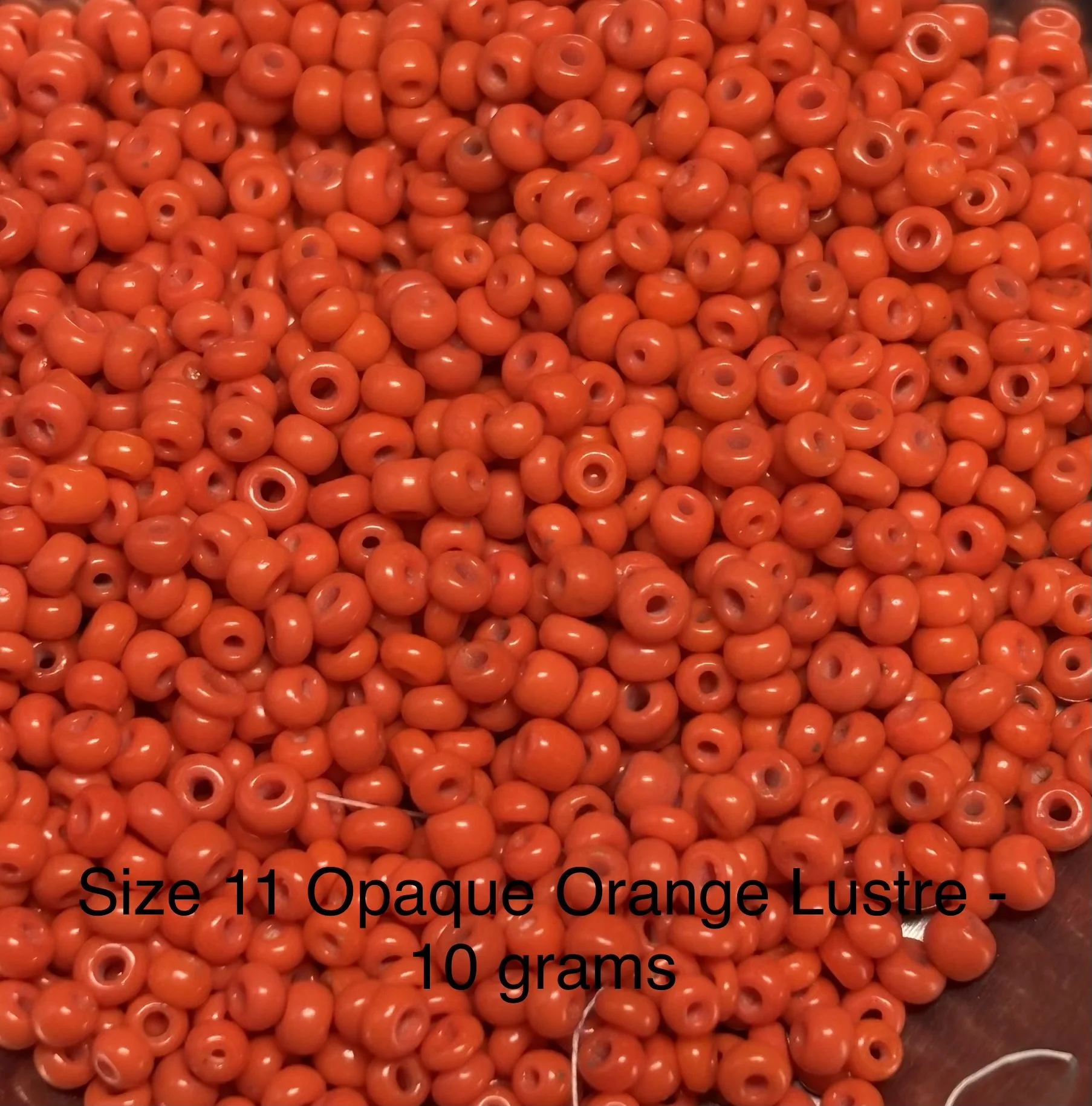 11/0 Antique Opaque Orange Luster
