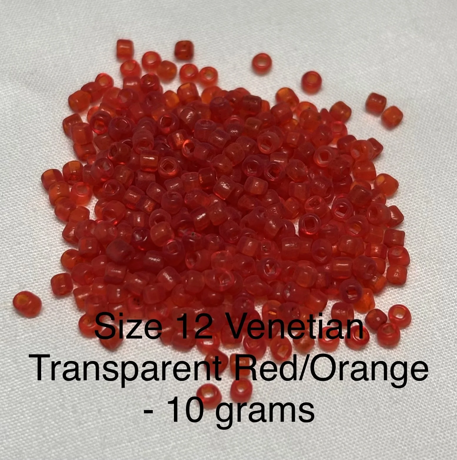 12/0 Antique Transparent Red/Orange