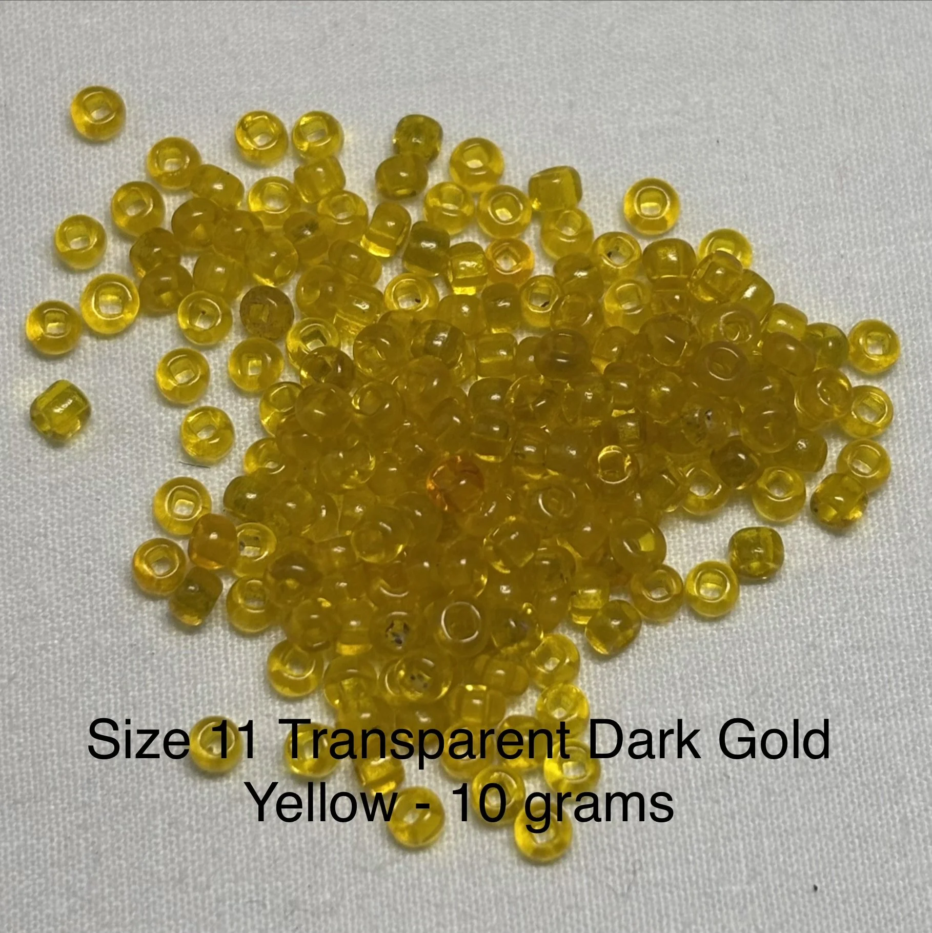 11/0 Transparent Dark Gold Yellow