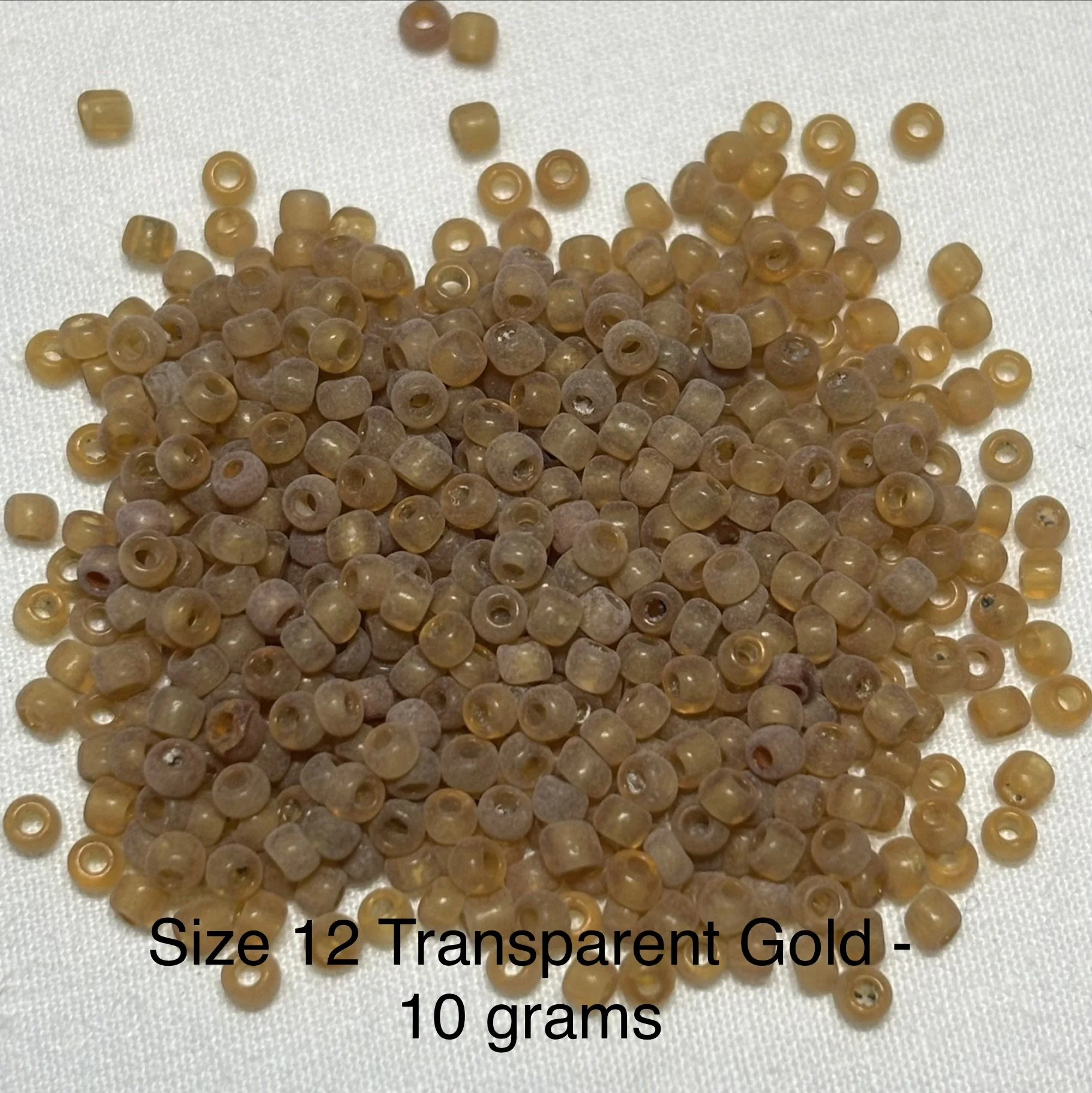 12/0 Antique Transparent Gold