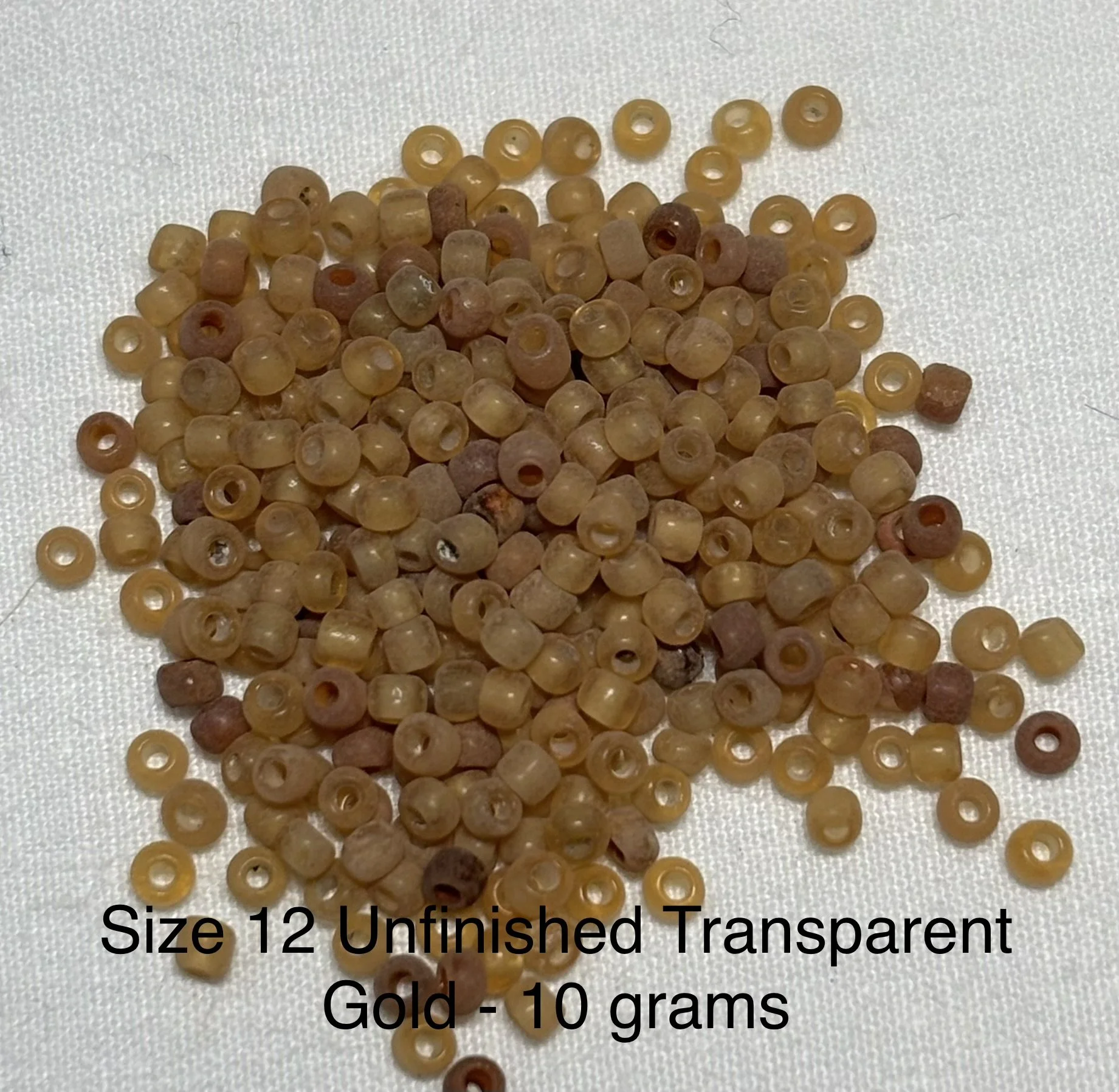 12/0 Antique Unfinished Transparent Gold