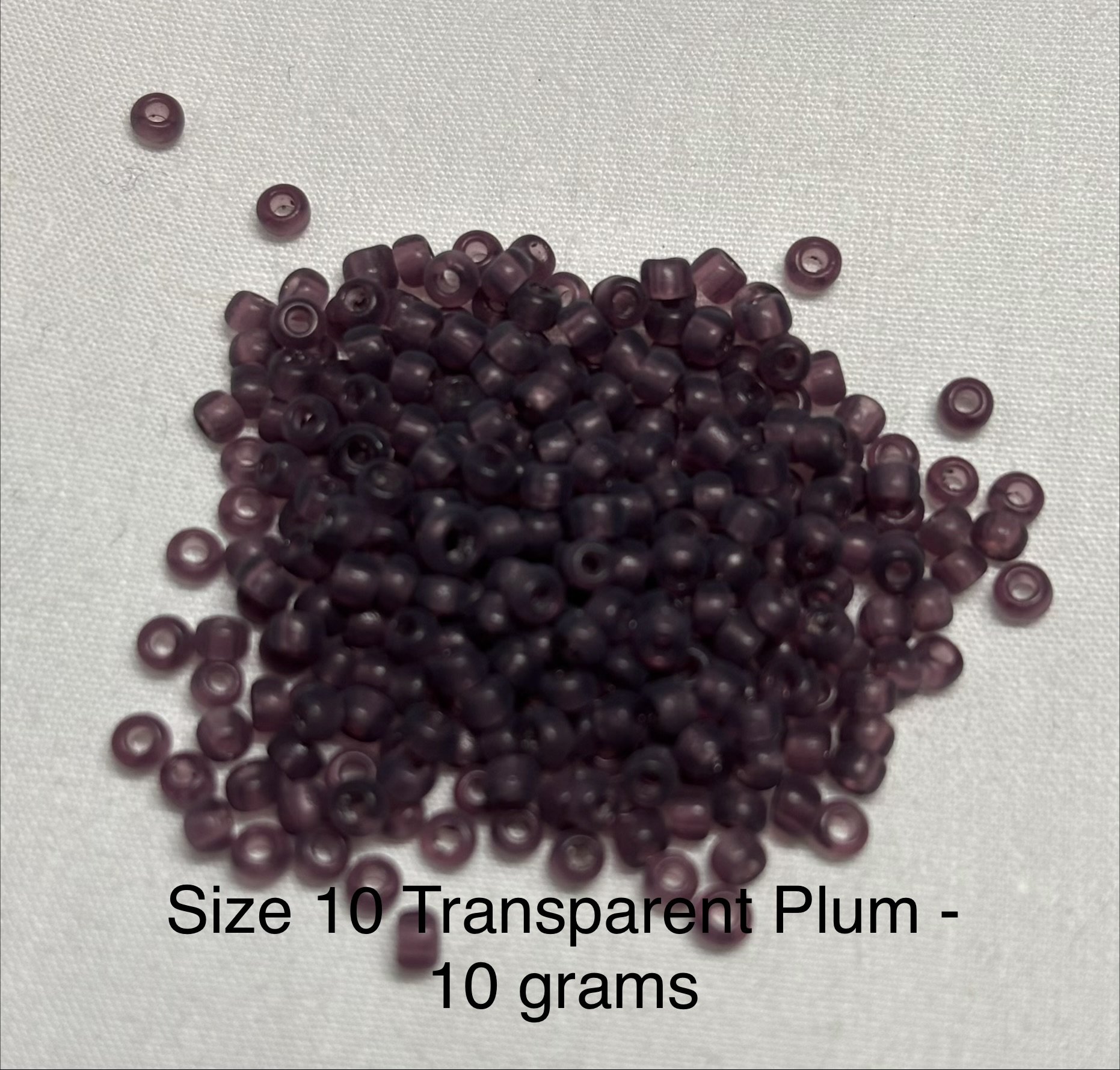 10/0 Antique Transparent Plum