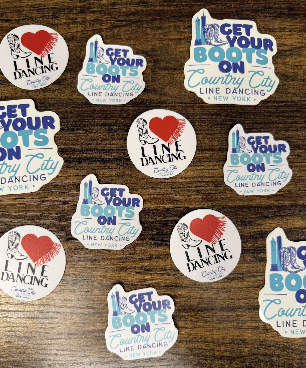 Collection of stickers for Country City Line Dancing in New York. Some stickers say "Get Your Boots On" with a cowboy boot and city skyline graphic, while others say "I Love Line Dancing" with a heart and cowboy boot graphic.