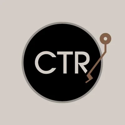 A circular icon with the text 'CTR' inside, a wintry sliding pin resembling a cursor arrow in the top right corner of the circle, and a light gray background.