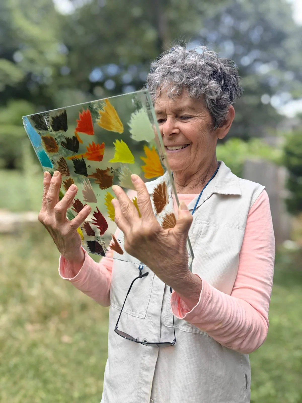 Joan looking at paint on glass taken by VicThor 2026.jpg