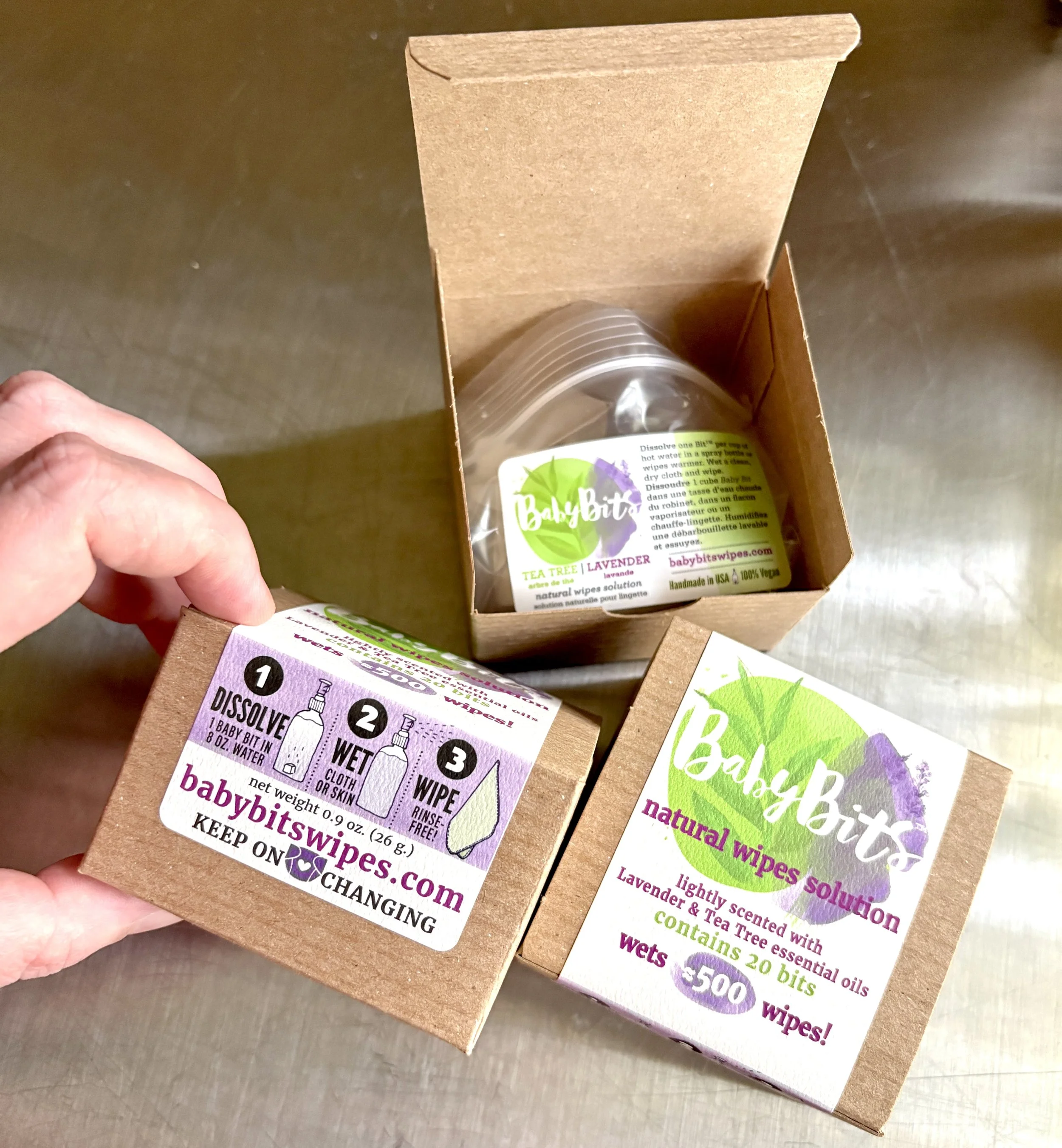hand holding up a box of Baby Bits showing the side label