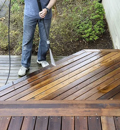 Wood deck prepared for pressure washing