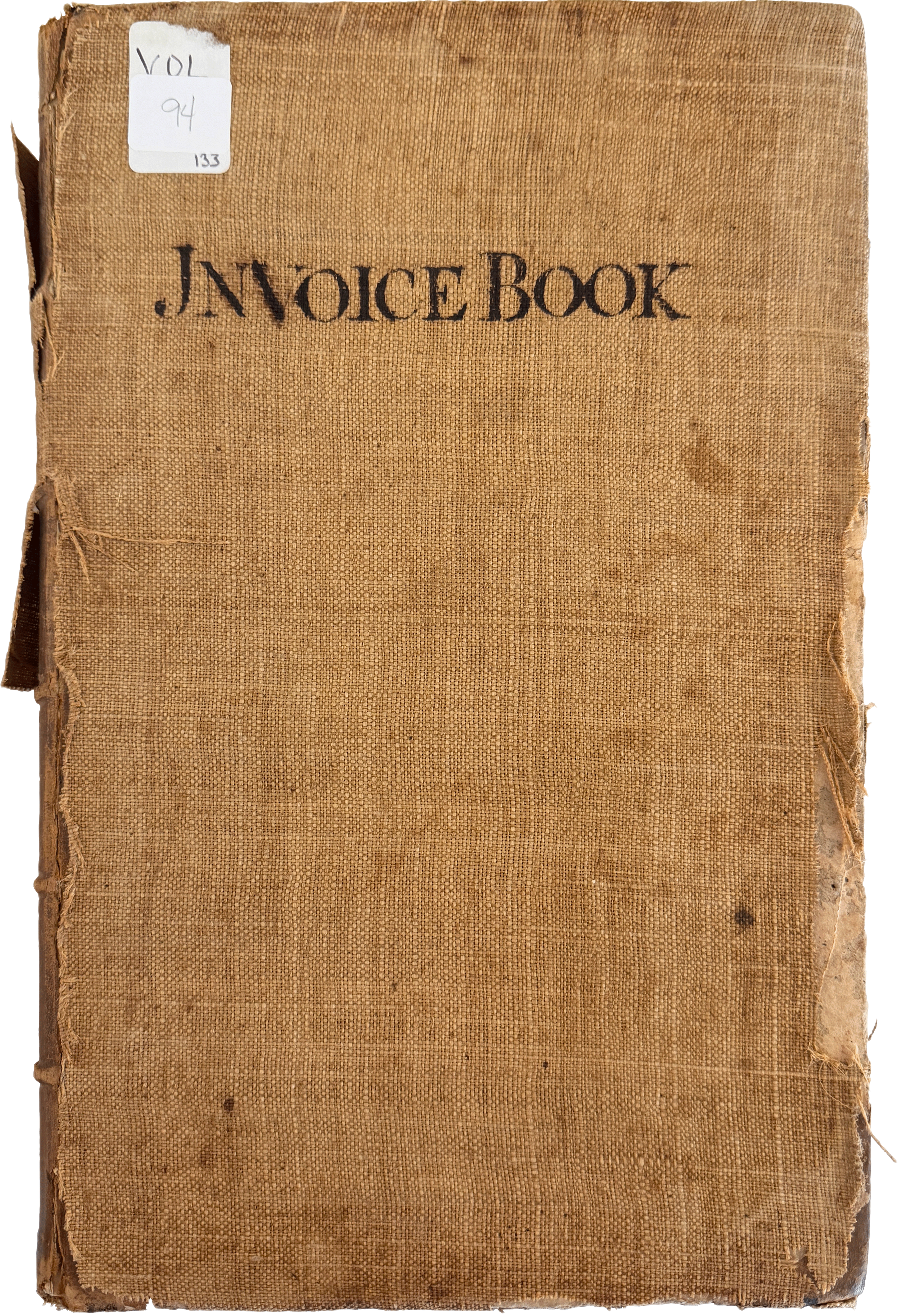 A tan Invoice Book, distressed with age and cataloged with a sticker reading "Vol 94, 133"  – genealogy research. © Butterworth Research