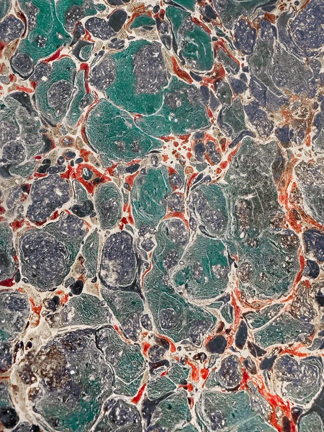 Traditionally hand-marbled paper design, popularly used for journals of the 17th- and 18th-centuries  – genealogy research. © Butterworth Research