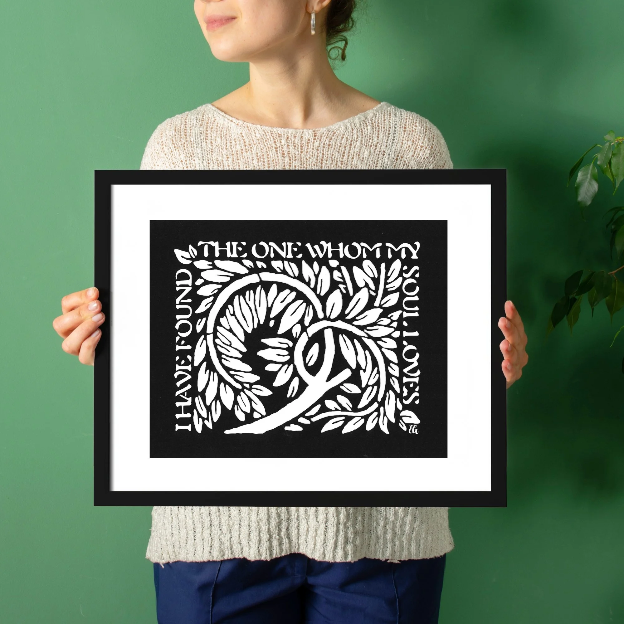 Woman Holding Romantic Quote Art