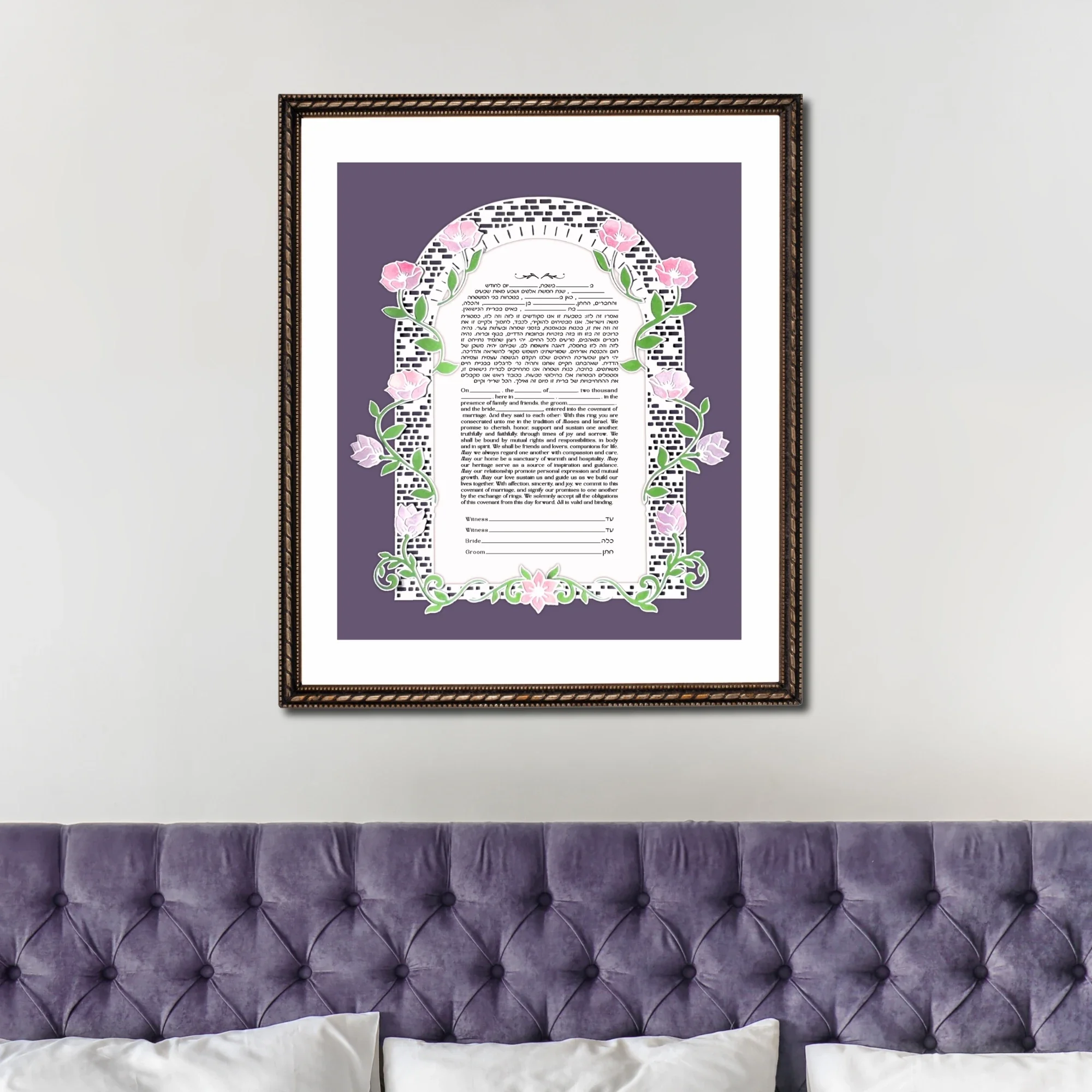 Floral papercut ketubah against a purple background in a simple black frame