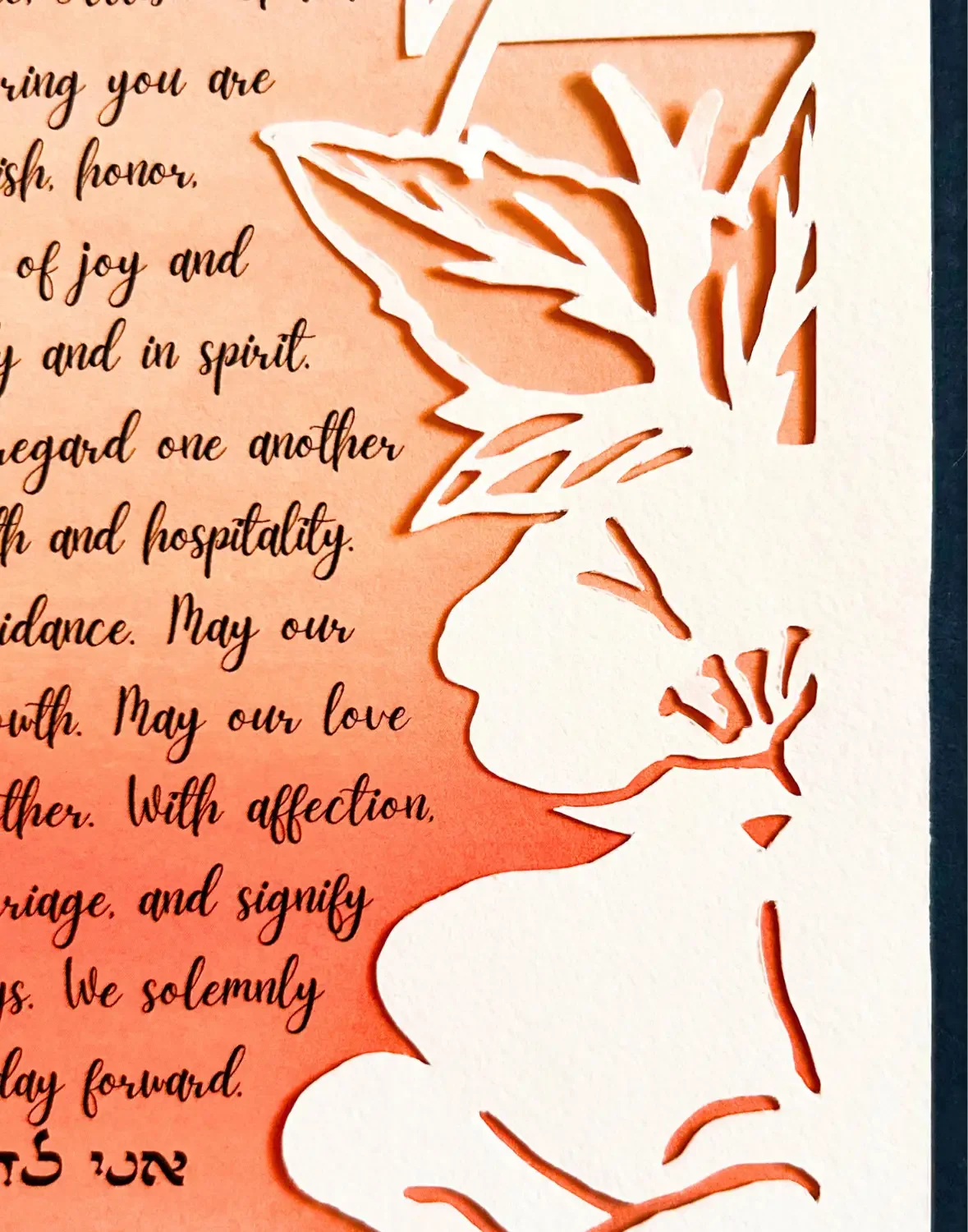 A close up of papercut flowers and leaves.