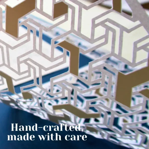 Hand-crafted, made with care. This image shows the underside of the papercut so you can see the detail work that goes into creating this piece.
