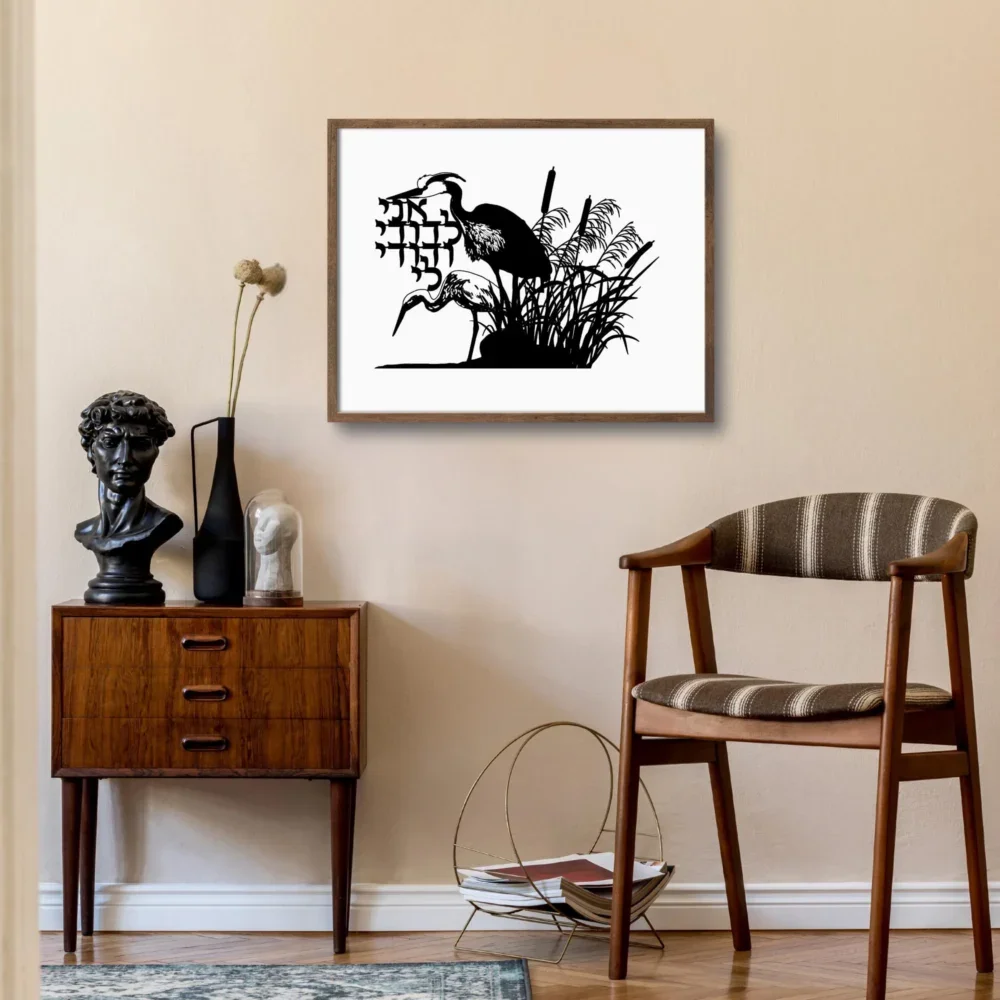 Black papercut on white romantic Hebrew papercut, framed, and on the wall of a mid-century seating area