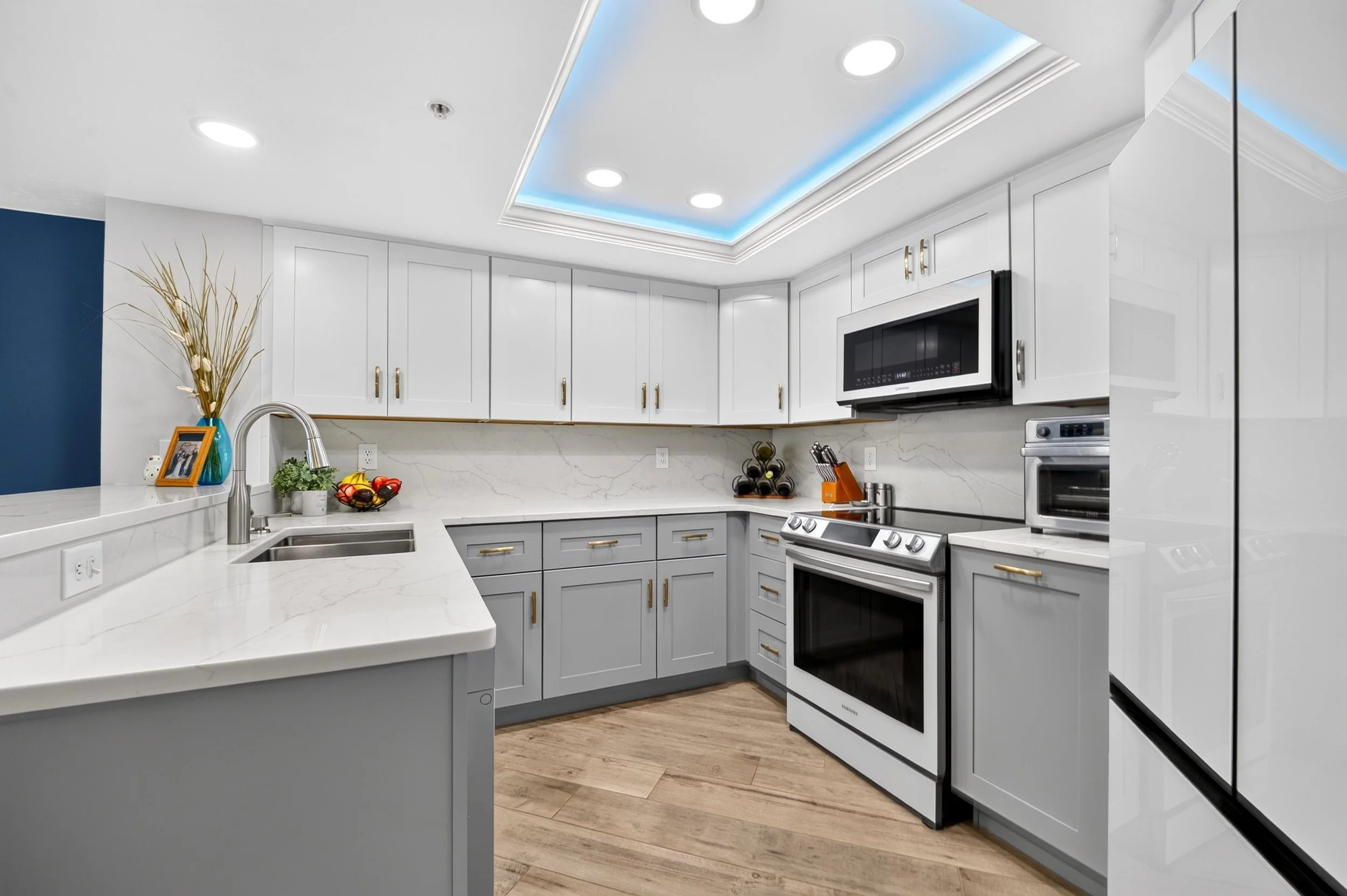 Luxury real estate photography of a modern kitchen in Orlando, Florida by Palm & Key Media