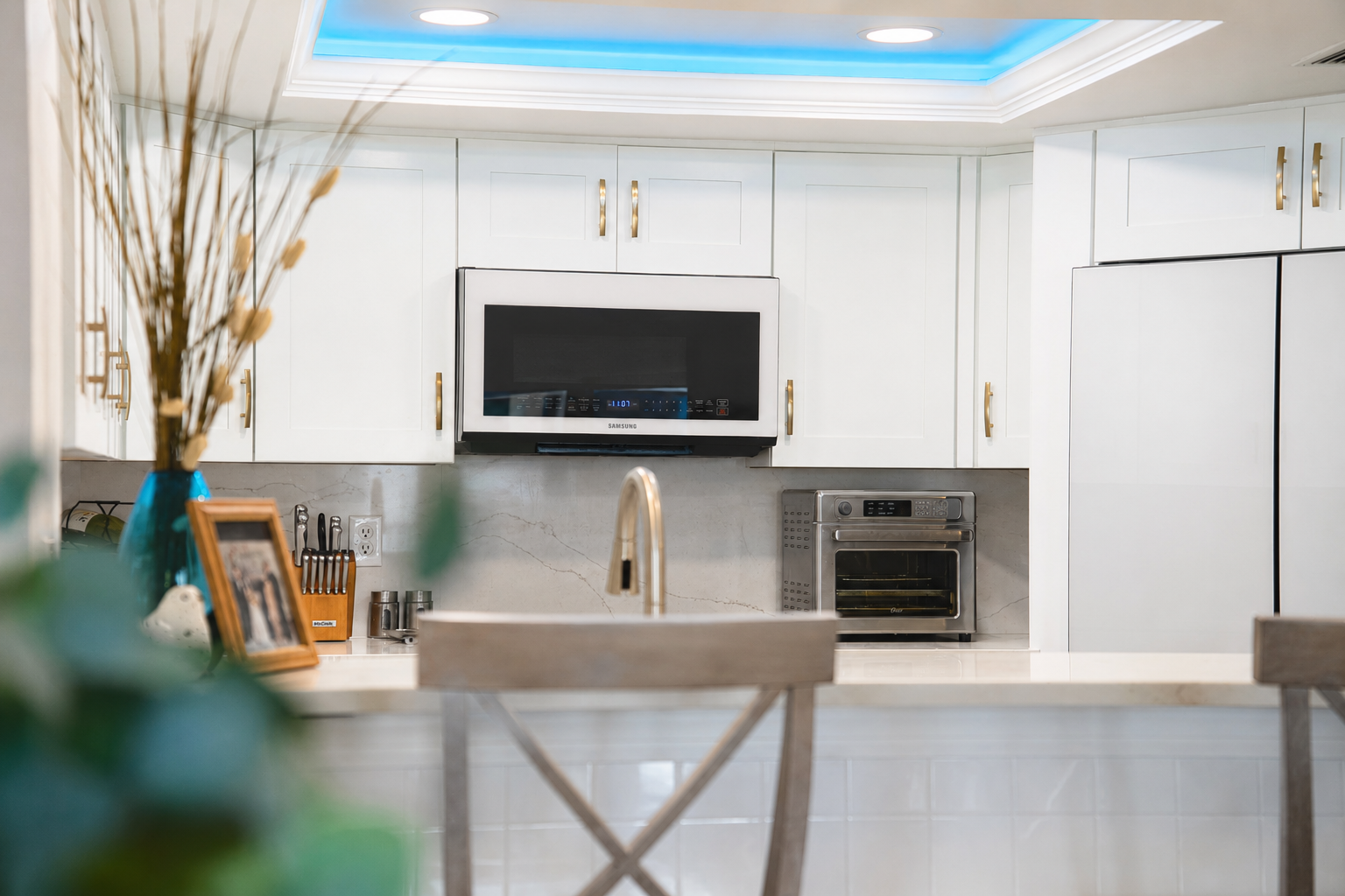 Luxury real estate photography of a modern kitchen in Orlando, Florida by Palm & Key Media