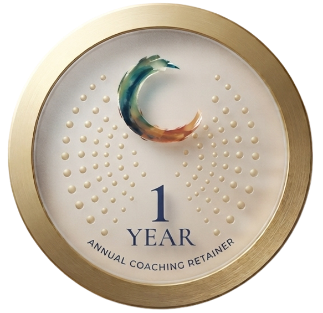 A circular gold-colored clock with a white face, featuring a colorful brushstroke crescent at the top, and the text '1 Year Annual Coaching Retainer' at the bottom.