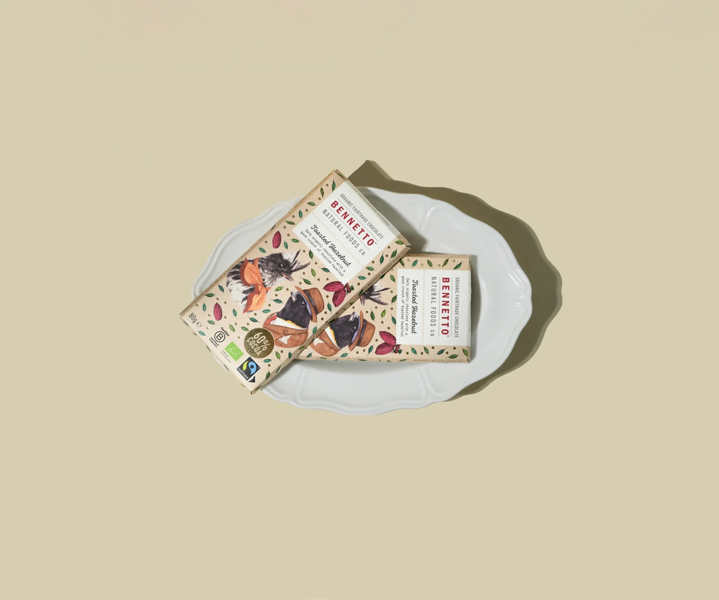 A little afternoon indulgence, featuring Bennetto.

Warm, buttery tones and crisp shadows, with simple styling that lets the illustrated packaging shine.
