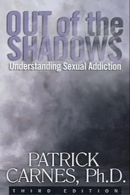 Book cover titled "Out of the Shadows: Understanding Sexual Addiction" by Patrick Carnes, Ph.D., third edition.