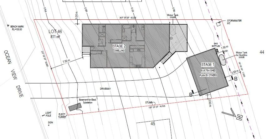 Site plan showing two buildings labeled 'Stage 1' and 'Stage 2' on a plotted lot with contour lines, driveways, water tank, stormwater pit, gas bottles, and various notes and measurements.