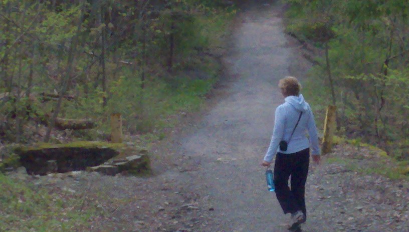 Woman walking on trail