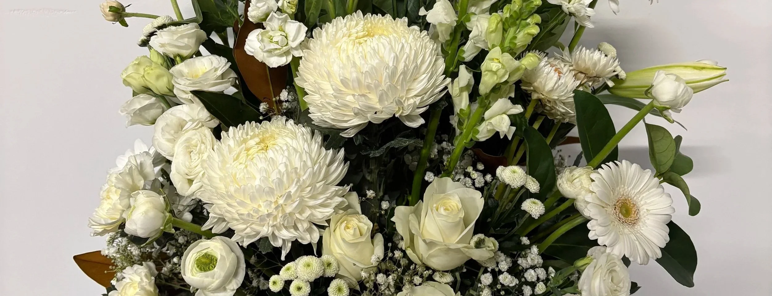 White floral bouquet with roses